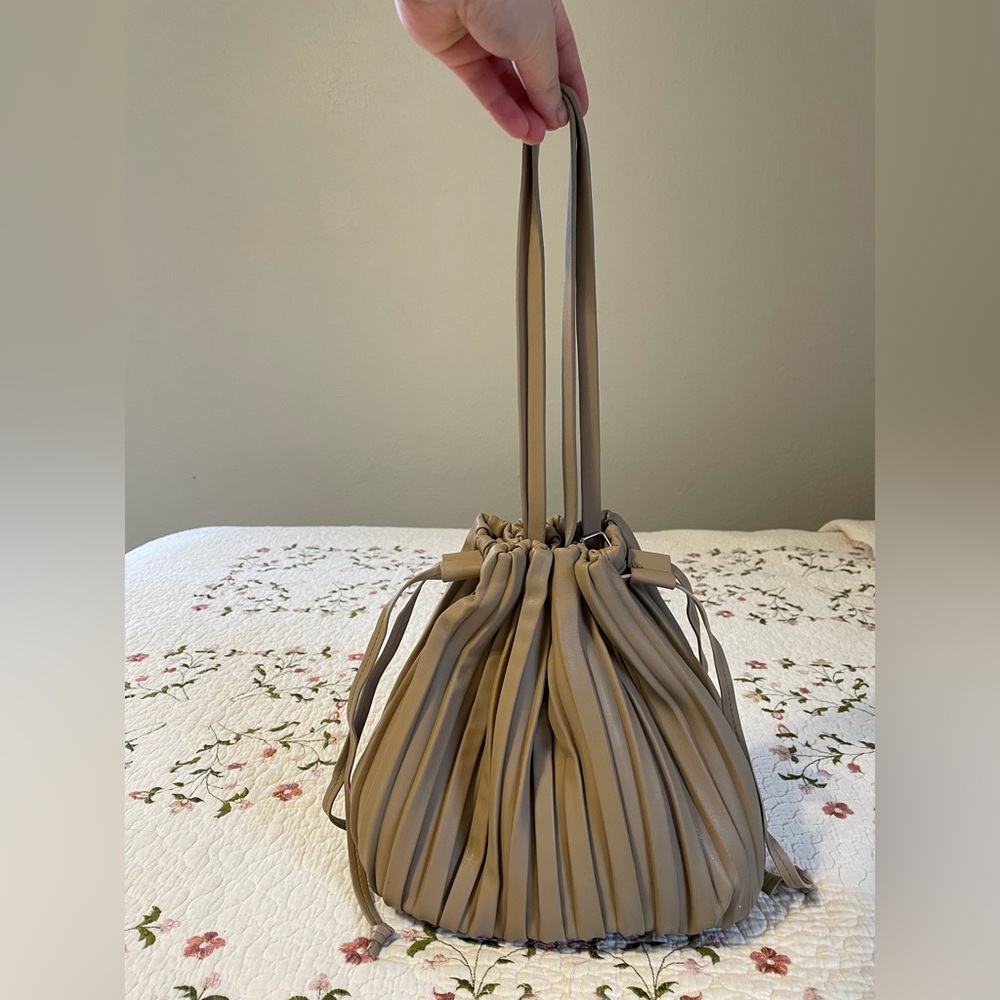 Beige bucket bag